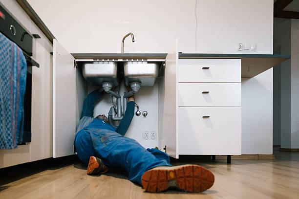 Professional Drain Cleaning technician working in Bushnell, IL
